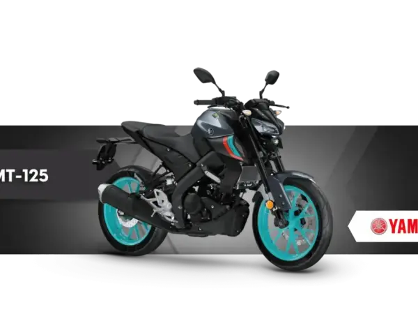 Szary motocykl Yamaha MT-125 z turkusowymi felgami, idealny do kategorii A1.